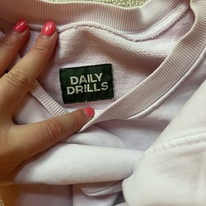 DAILY DRILLS LIGHT PINK CREWNECK